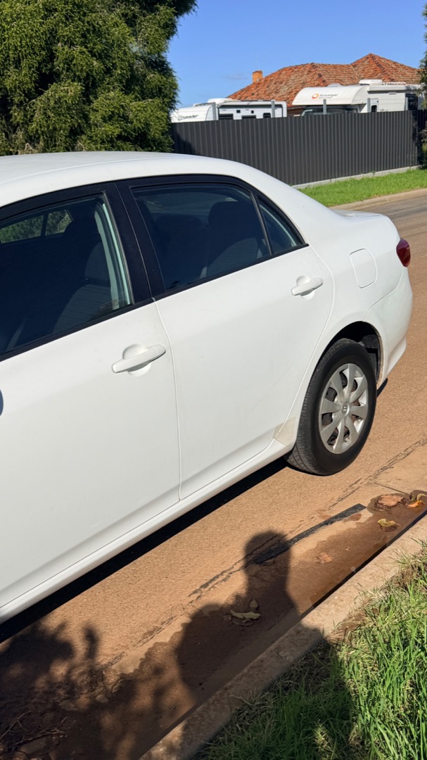 2008 Toyota Corolla Ascent — rear, driver side