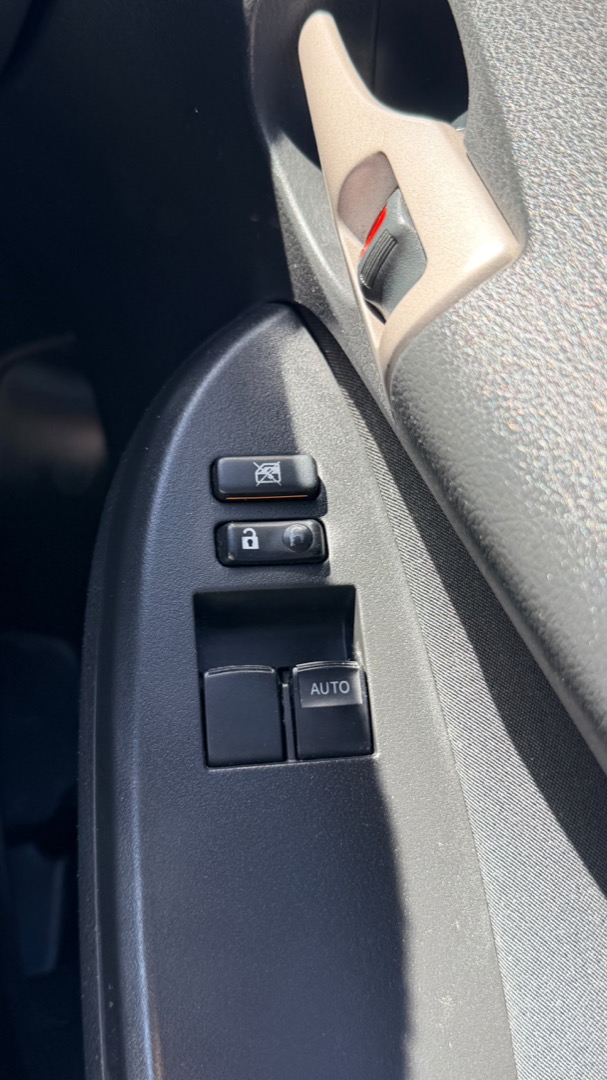2008 Toyota Corolla Ascent — driver door controls