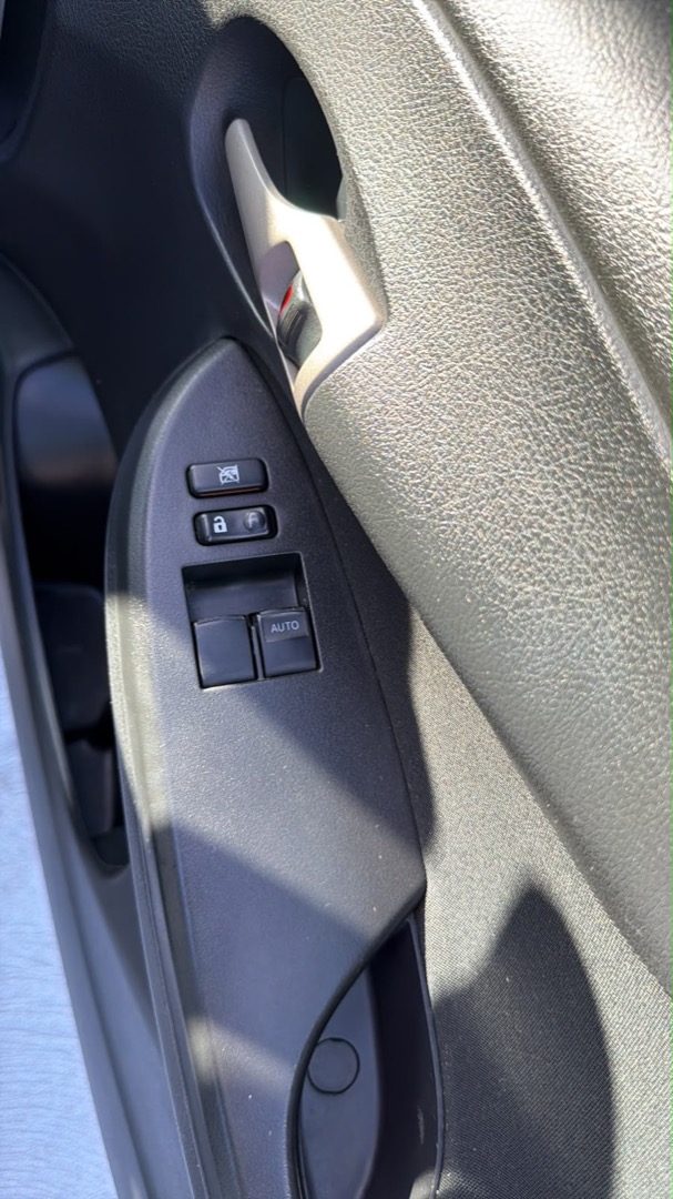 2008 Toyota Corolla Ascent — driver door controls